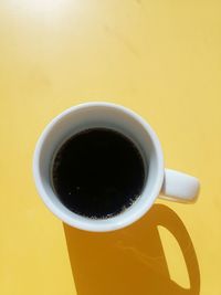 Close-up of coffee cup on table