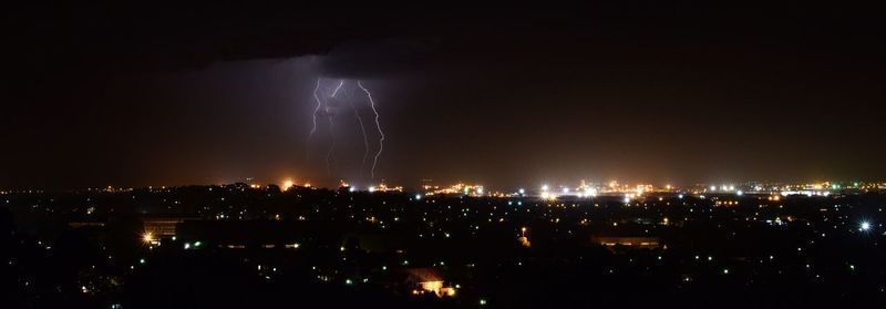 Aerial view of illuminated cityscape