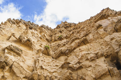 Low angle view of mountains against sky