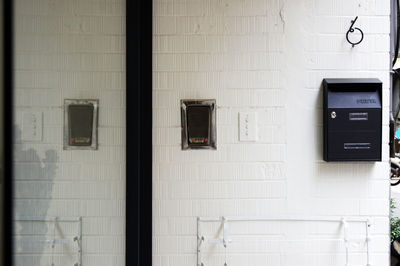 Mailbox on white wall