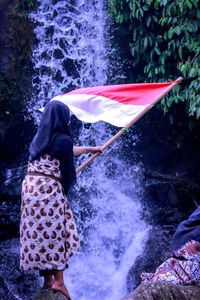 Woman standing in water