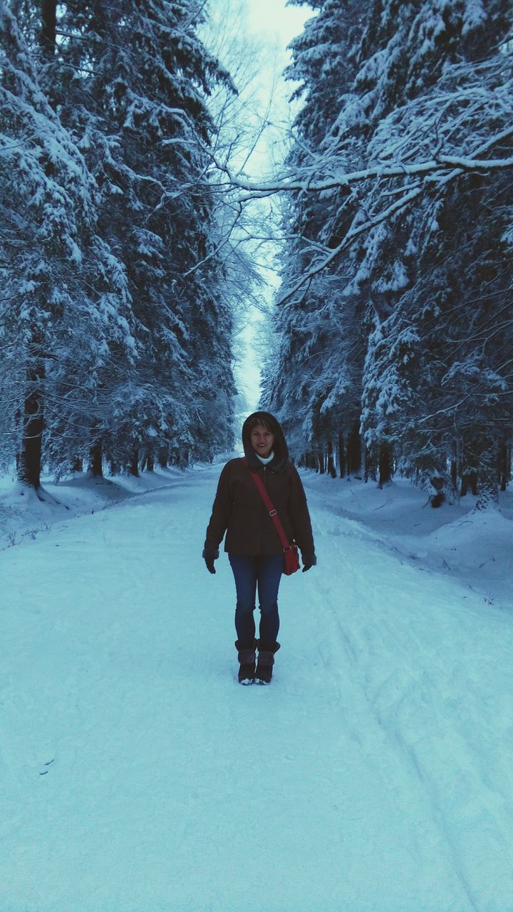 winter, snow, tree, one person, cold temperature, rear view, one man only, full length, people, outdoors, nature, day, only men, warm clothing, adults only, adult, snowing, young adult