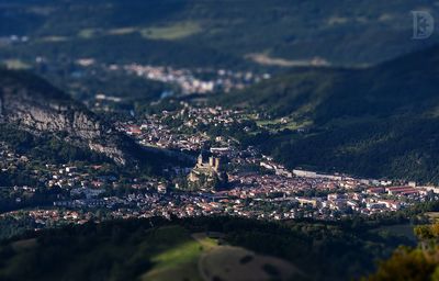 High angle view of illuminated buildings in city