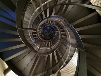 Directly below shot of spiral staircase in building