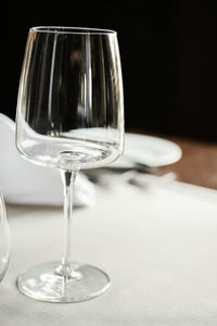 Close-up of wineglass on table