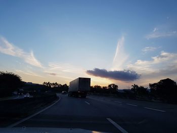 Road against sky during sunset