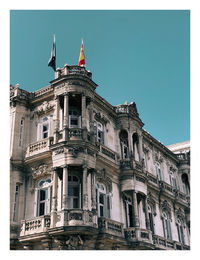 Low angle view of building against clear sky