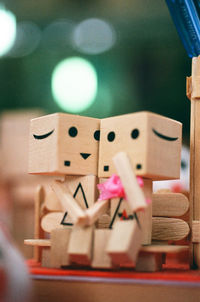 Close-up of wooden figurines on table 