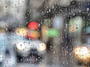 Full frame shot of wet window in rainy season