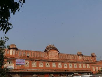 Low angle view of old building against clear sky