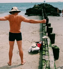 Woman standing on beach