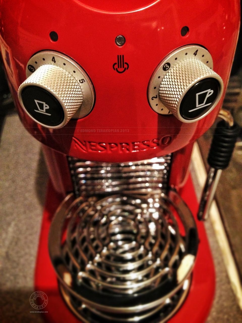 red, close-up, metal, technology, still life, focus on foreground, metallic, indoors, high angle view, no people, single object, old-fashioned, equipment, protection, safety, man made object, day, shiny, retro styled, security