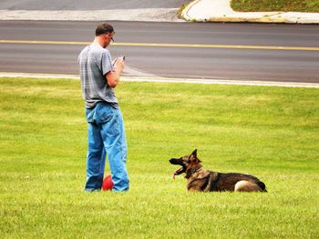 Man standing on grassy field