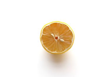 Close-up of lemon against white background