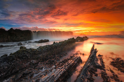 Scenic view of sea against sky during sunset