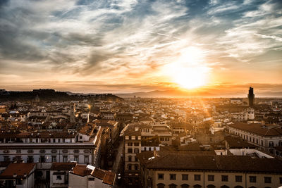 High angle view of city at sunset