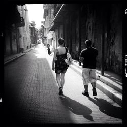 Woman walking on city street