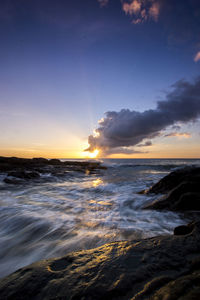 Scenic view of sea against sky during sunset