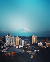 High angle view of buildings in city against sky
