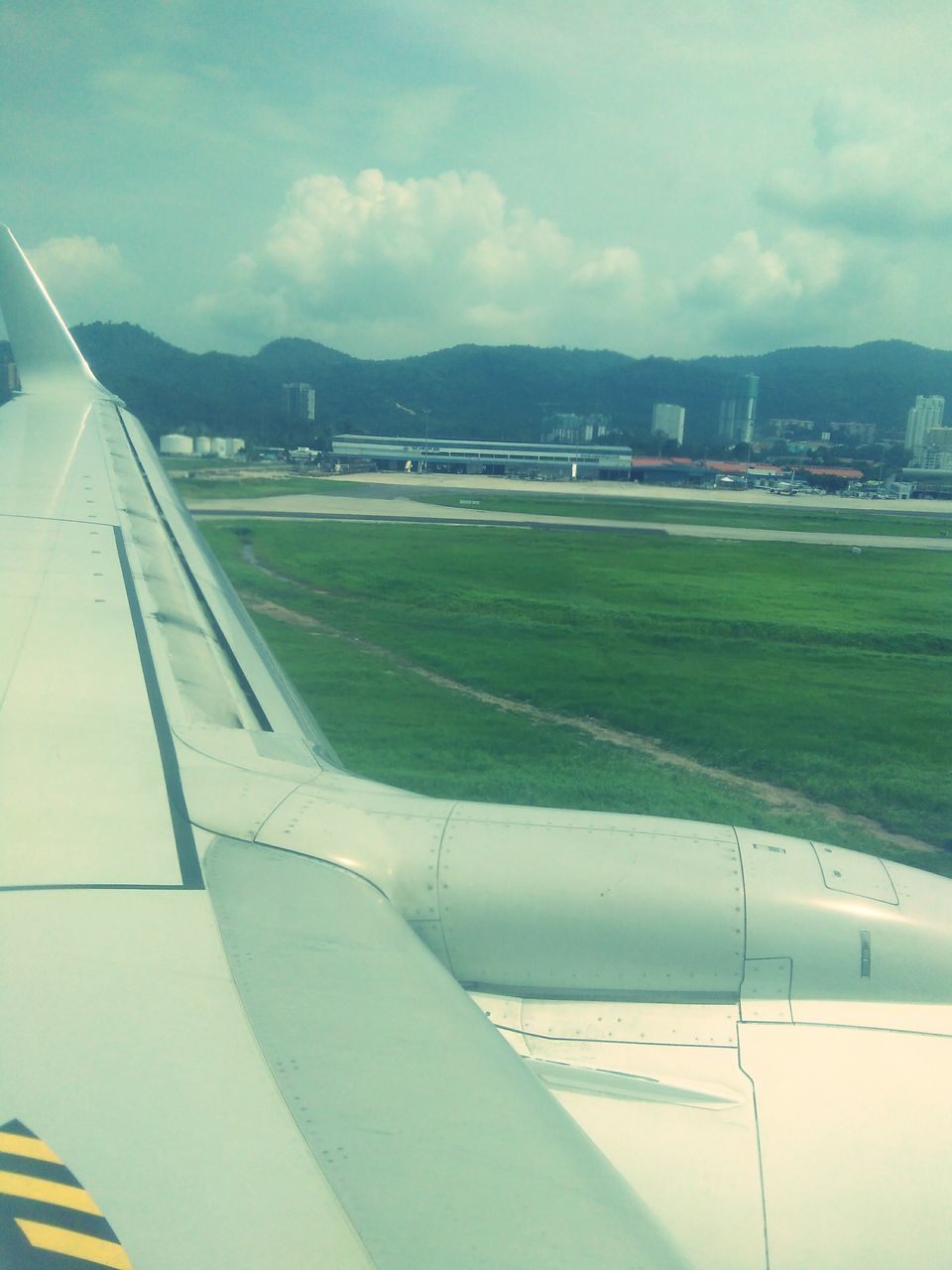 sky, mode of transport, cloud - sky, cloud, part of, cropped, cloudy, day, landscape, outdoors, no people, journey, nature, airport runway, the way forward, diminishing perspective, empty