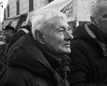 Portrait of man looking at city