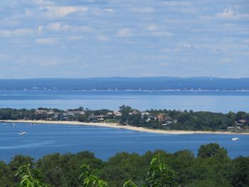 Scenic view of beach and sea against sky