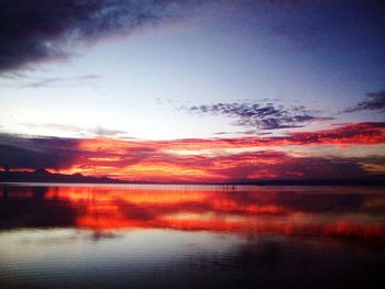 Scenic view of sea against sky at sunset