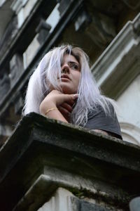 Low angle view of woman on staircase