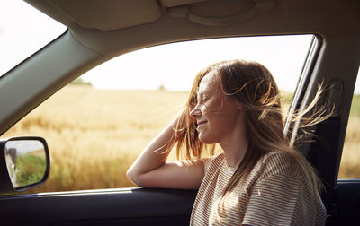 Woman sitting in car