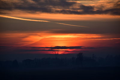 Scenic view of dramatic sky during sunset