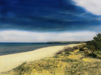 Scenic view of beach against sky