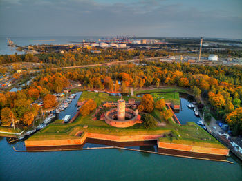 High angle view of trees and buildings against sky