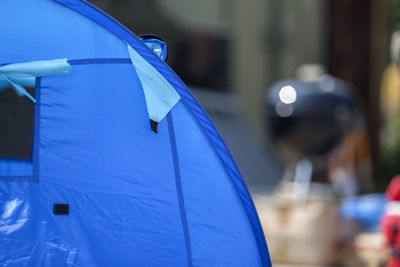 Cropped image of blue tent