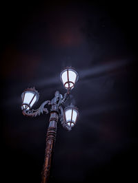 Low angle view of illuminated street light