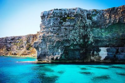 Scenic view of rock formation in sea