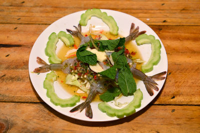 High angle view of salad in plate on table