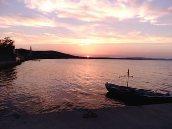 Scenic view of sea at sunset