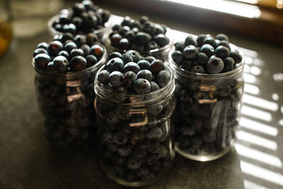 High angle view of fruits in jar on table