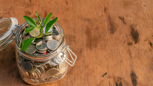 High angle view of glass jar on table