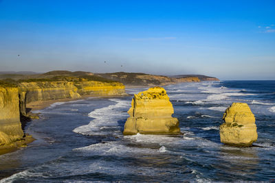 Scenic view of sea against sky during winter