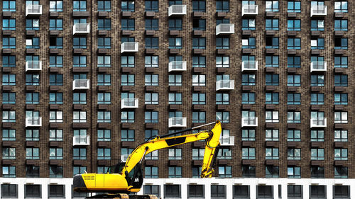 Low angle view of yellow office building