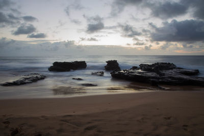 Scenic view of sea against sky during sunset