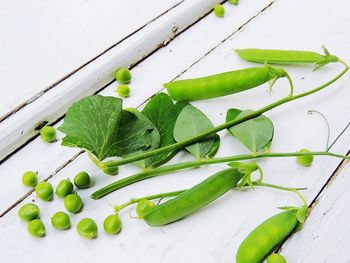 High angle view of green peas on table