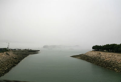 Scenic view of sea sky in foggy weather