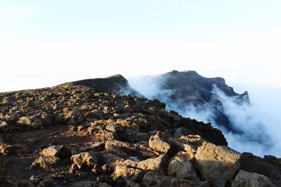 Scenic view of rocks against sky