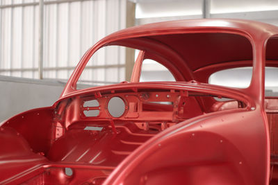 Close-up of red vintage car