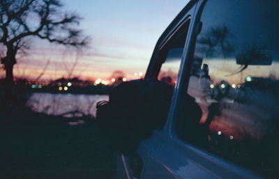 Reflection of sky seen through car window