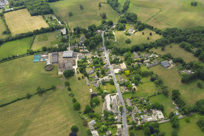 High angle view of agricultural field and buildings