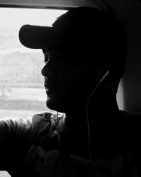 Portrait of young man looking away