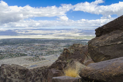 View of landscape against cloudy sky